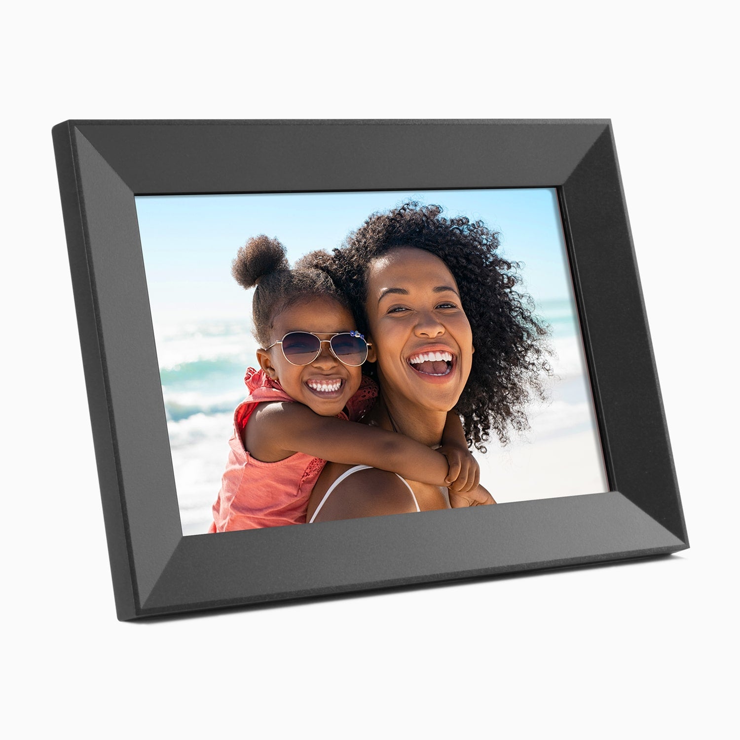 Digital photo frame displaying a happy mother and daughter at the beach